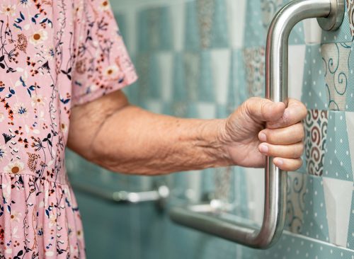 Asian senior or elderly old lady woman patient use toilet bathroom handle security in nursing hospital ward, healthy strong medical concept.